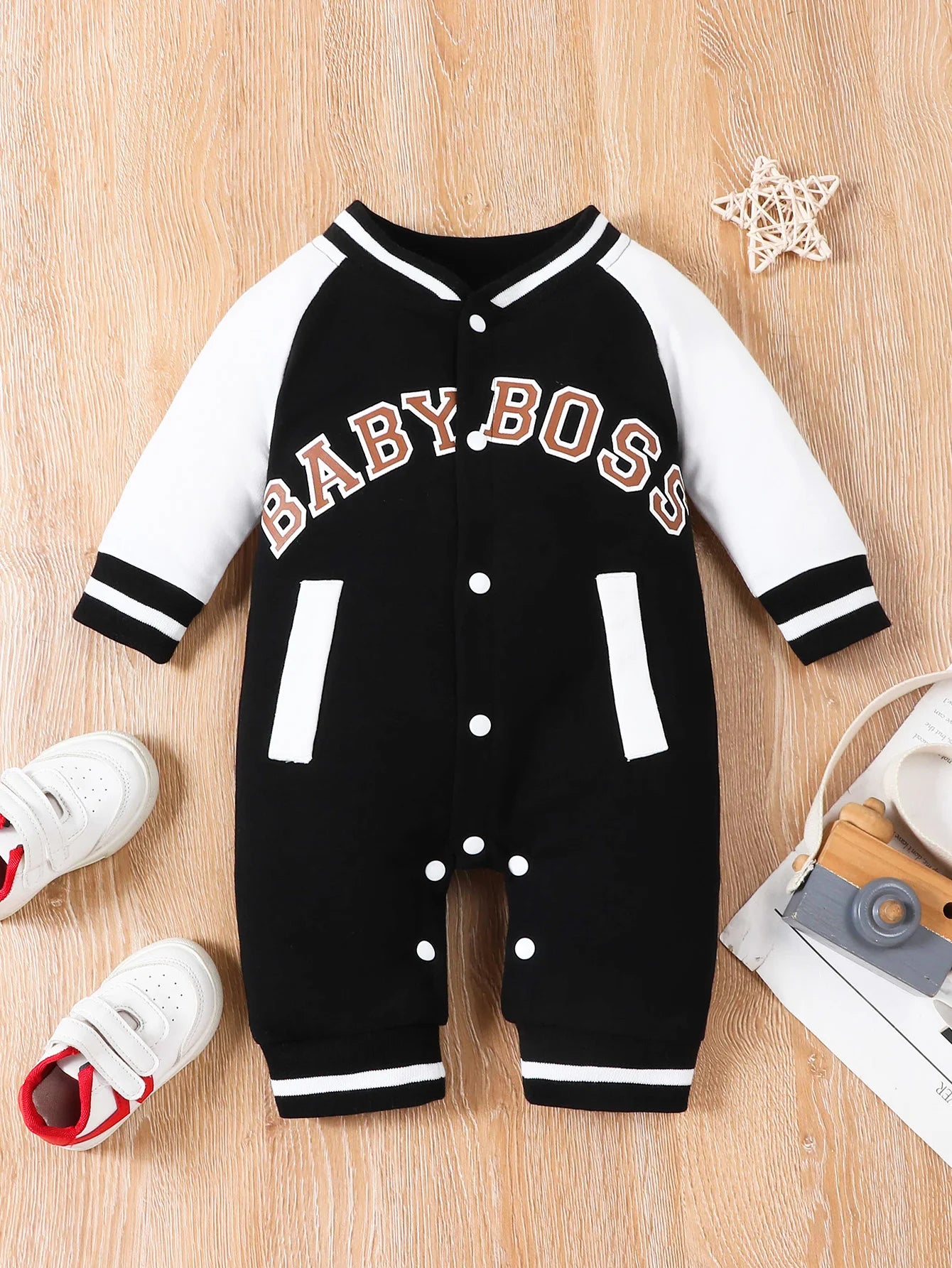 Fashionable letter printed black long sleeved round neck baby boy jumpsuit