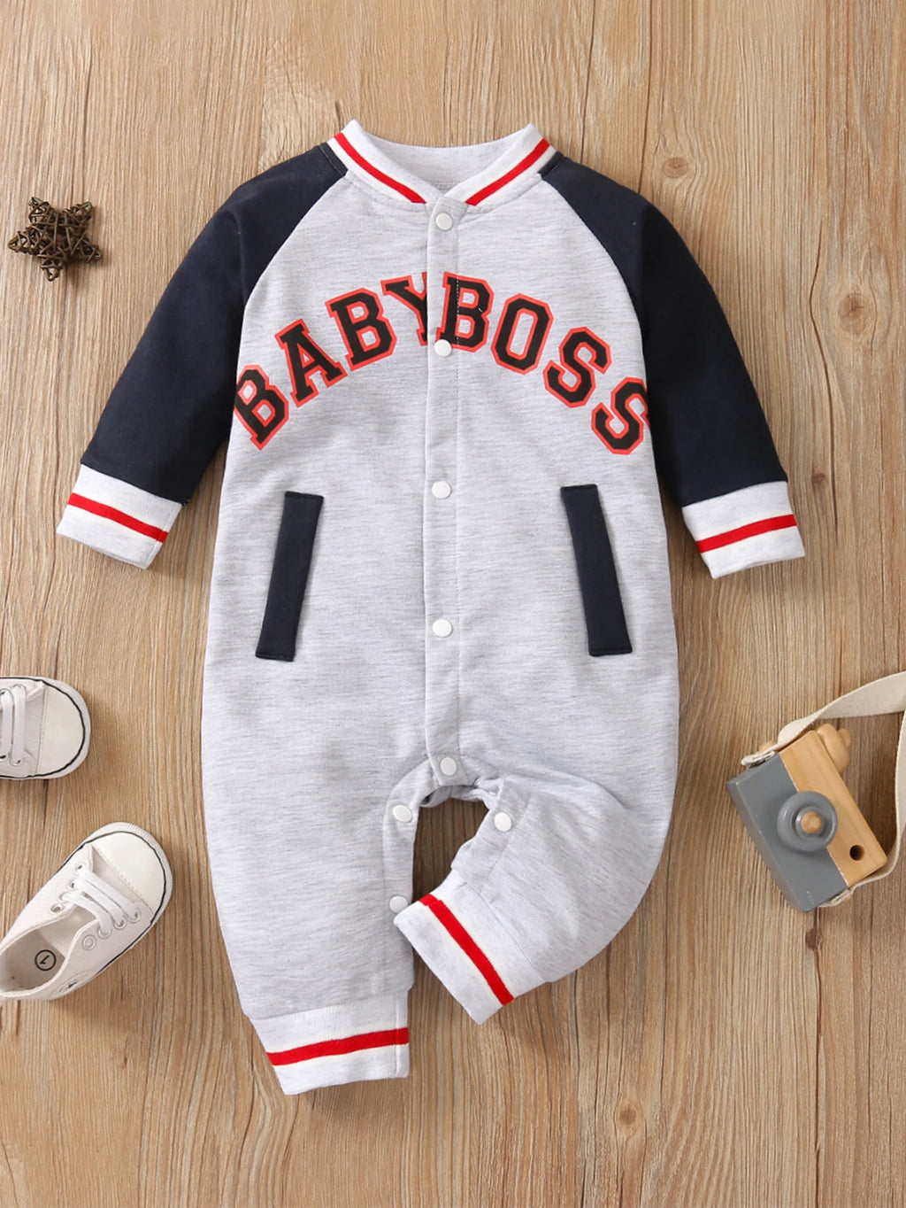 Fashionable letter printed black long sleeved round neck baby boy jumpsuit